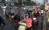 [ẢNH] Những kỹ năng lái xe an toàn khi trời mưa, ngập úng